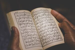 Quran in Hands