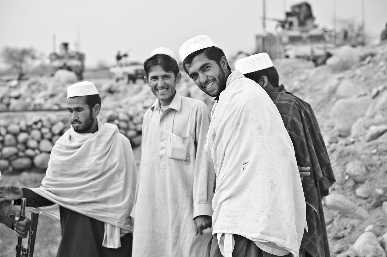 Muslim Men Wearing Kufi Hats