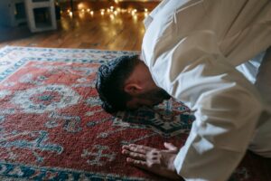 Many Prostrating during Islamic Prayer