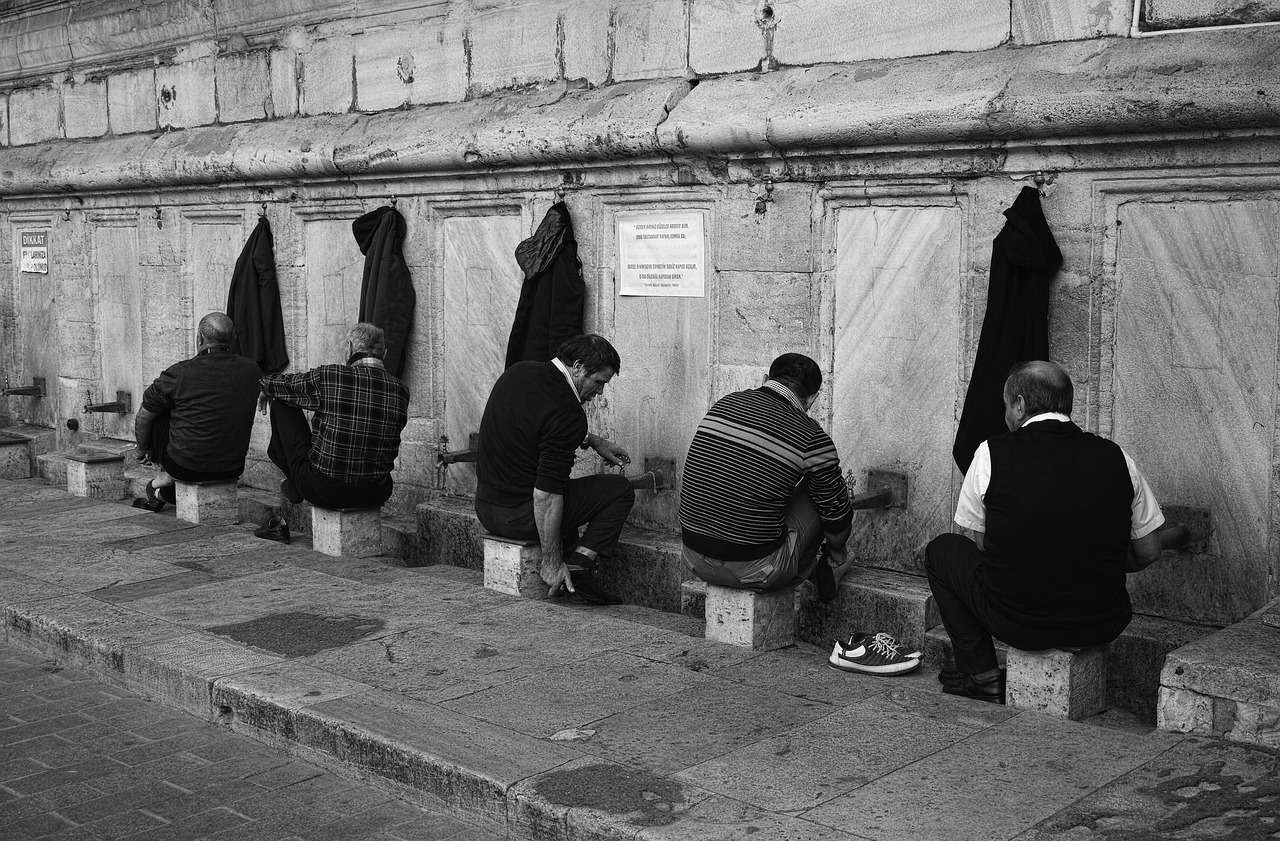 Muslims performing ablution